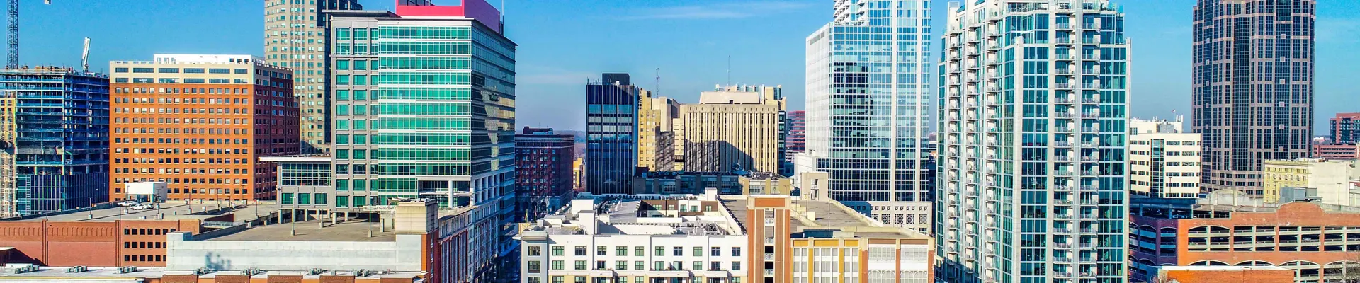 raleigh-downtown-skyline-blue-sky