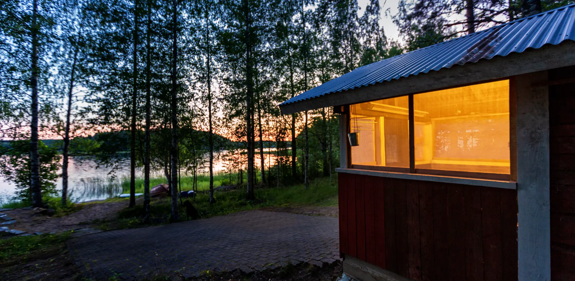 Sauna Building Near The Lake In The Summer Evening, Finland
