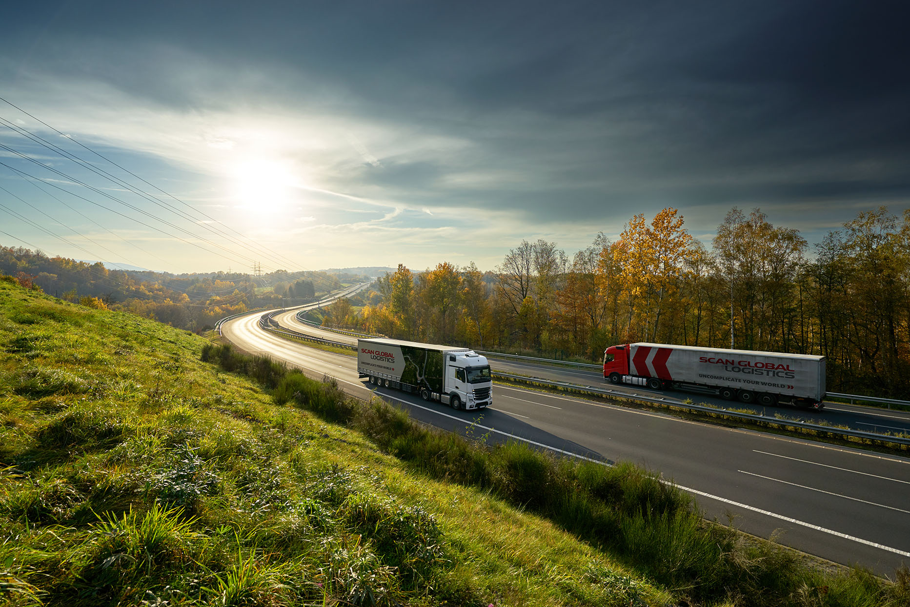 Trucks Driving In Highway Straight Angle 01