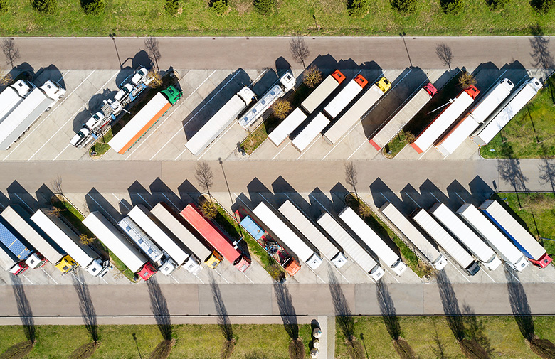 aerial-view-semi-trucks-trailers-parking-lot