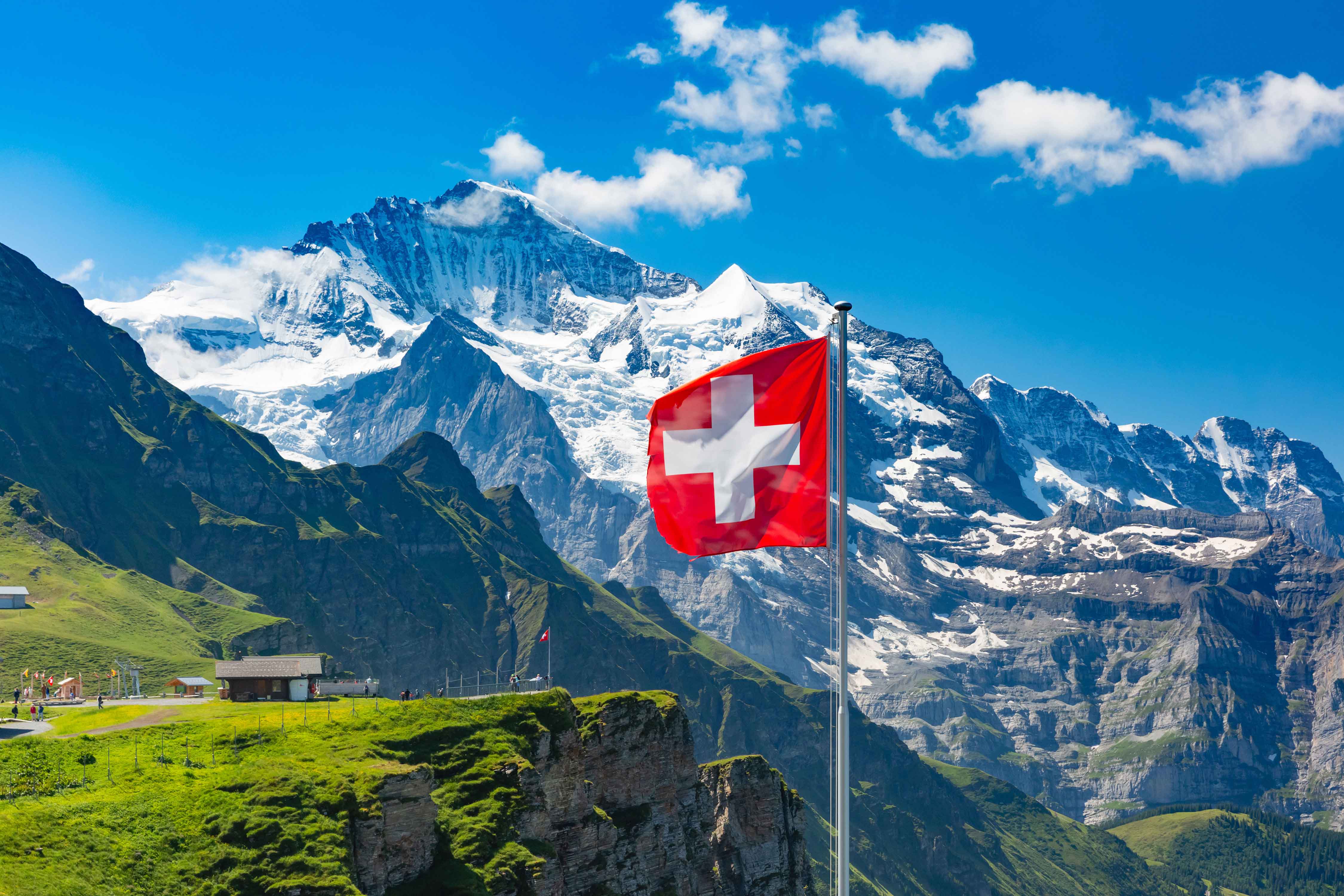 swiss-flag-alps-mountain-landscape