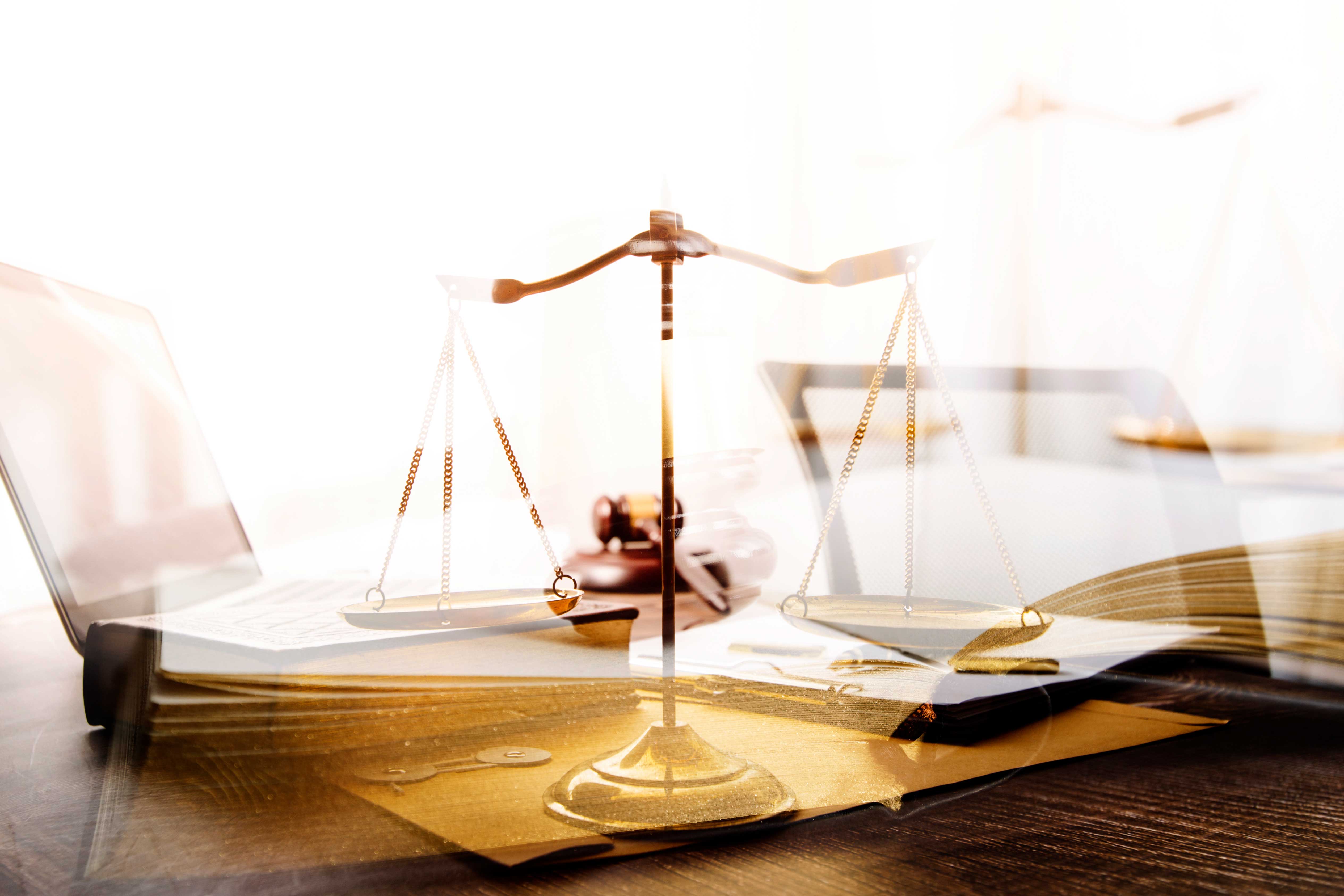 Business And Lawyers Discussing Contract Papers With Brass Scale On Desk In Office. Law, Legal Services, Advice, Justice And Law Concept Picture With Film Grain Effect