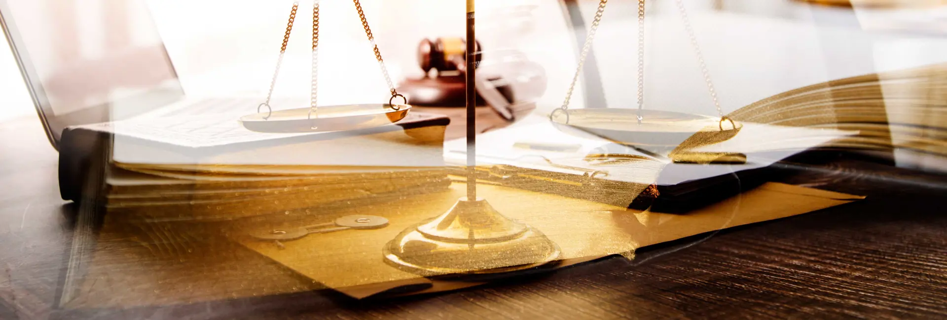 Business and lawyers discussing contract papers with brass scale on desk in office. Law, legal services, advice, justice and law concept picture with film grain effect