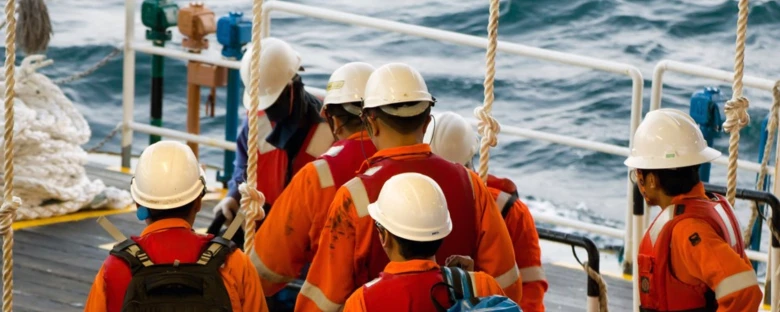 Worker on deck of offshore vessel or ship